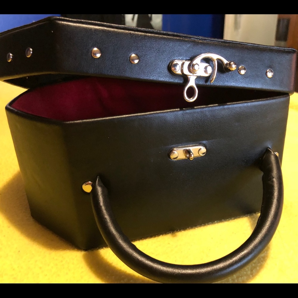 Faux leather coffin purse. Gently used.